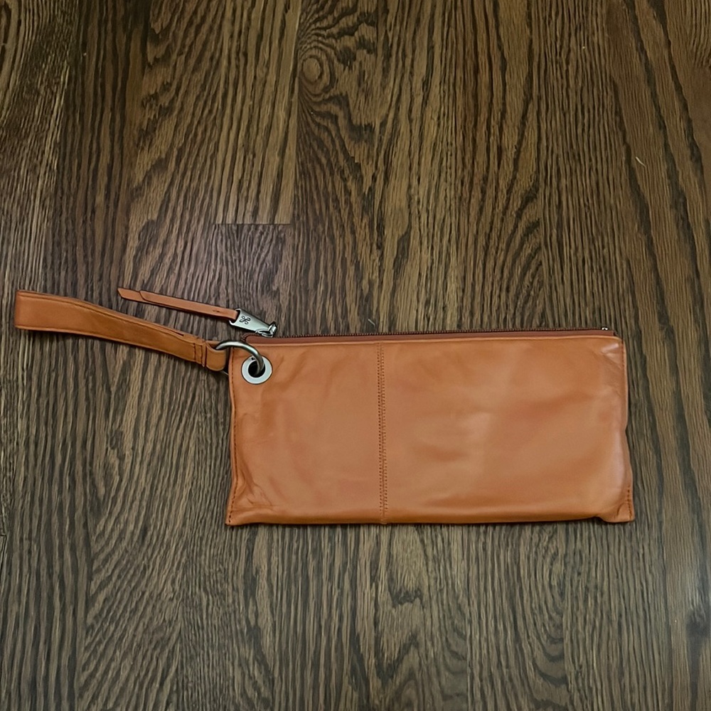 HOBO orange leather clutch